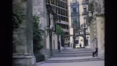 Spain (1972): People Walking And One Person Sitting In A Lovely View