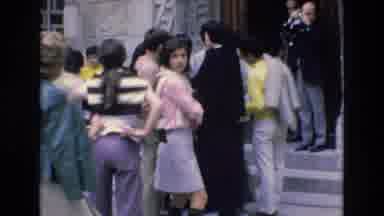 Spain (1972): People Conversing On The Sidewalk Outside Of A Building