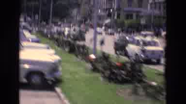 Spain (1972): A Bright And Sunny Day In The 1960s Showing Parked And Driving Cars