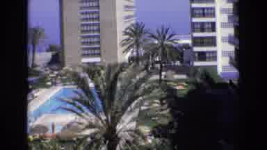 Spain (1972): Footage Of Hotel Resort On Beach As Well As Palm Trees