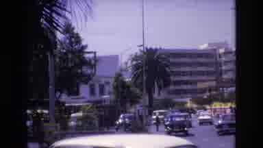 Spain (1972): Few People Standing Near A White Colored Car Parked On The Platform