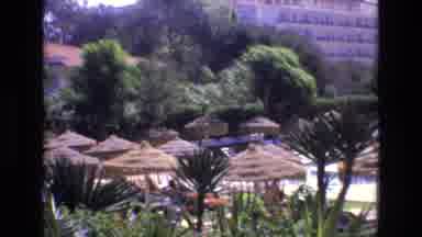 Spain (1972): Relaxing Resort With Trees And Pool Chairs