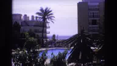 Spain (1972): Sunny Surfside Town Woman Sunbathing In Retro Sunglasses