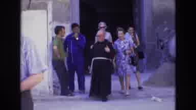 Spain (1972): Monk Walking With Women