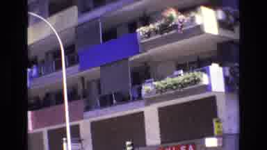 Spain (1972): Person Living Their Life In Apartments