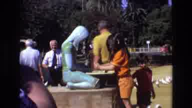 Spain (1972): Green Statue Orange Girl Blue Woman White Birds Yellow Park Green