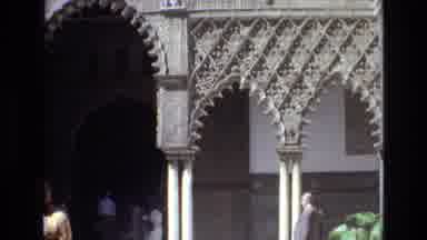 Spain (1972): People Outside Looking In Temple Walking Around On Sunny Day