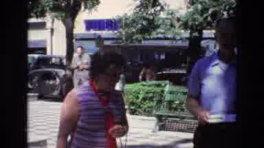 Spain (1972): People On A Day Out At Shopping Center Square