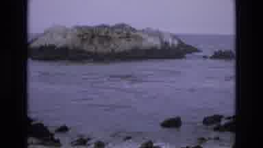 Central Coast California USA (1973): Water Crashing Against A Rock