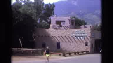 Colorado USA (1973): Woman And Child Meeting In Front Of Adobe Building