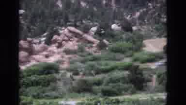 Colorado USA-1973: Drivers Travel Through Natural Beauty Near Red Rocks