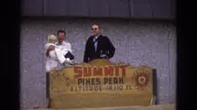 Colorado USA (1973): People Standing Behind A Sign Saying Summit Pikes Peak