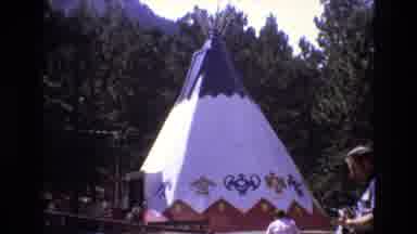 Colorado USA (1973): Group Of Tourists Photograph And Walk Toward Native American