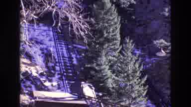 Colorado USA (1973): Incline Trees Bare Pine Building Snow