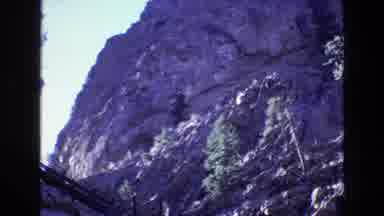 Colorado USA (1973): Mountains Rock Snow Raised Bridge Trees Clear Sky Park