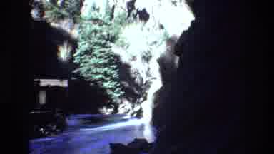 Colorado USA (1973): Lonely Cave Empty Path Partial Sun Light Green Trees Snow On