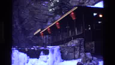 Colorado USA (1973): Red Lanterns Hanging On A Porch That Overlooks A Snow Bank