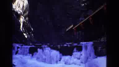 Colorado USA (1973): Icy Snow Covered Ground Rocky Mountain Cliff Side Near Wood