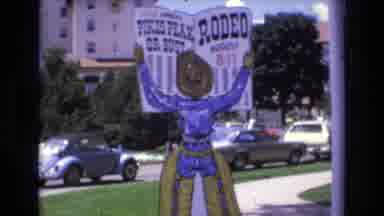 COLORADO SPRINGS COLORADO USA .-1973: Advertising Sign And Woman Standing By A