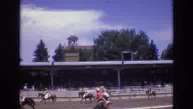 COLORADO SPRINGS COLORADO USA .-1973: Group Of Jockeys Running Around At A Horse