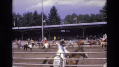 COLORADO SPRINGS COLORADO USA .-1973: Horses Jockeys Fence Track Pavilion