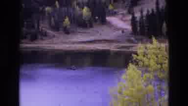 COLORADO SPRINGS COLORADO USA .-1973: Lone Fisherman In Gravel Quarries On Dingy