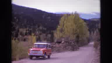 COLORADO SPRINGS COLORADO USA .-1973: Red Suv On Desert Road And Mine Shaft
