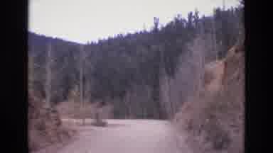 COLORADO SPRINGS COLORADO USA .-1973: Scenic Dirt Road Driving While Wondering