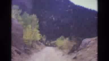 COLORADO SPRINGS COLORADO USA .-1973: Moving Down Dirt Road Toward A Mountain