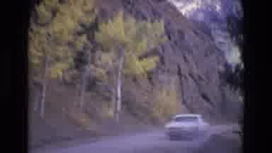 COLORADO SPRINGS COLORADO USA .-1973: Car Driving In A Mountain Valley