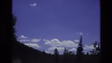 COLORADO SPRINGS COLORADO USA .-1973: Sky Clouds Tree Winding Blue Green