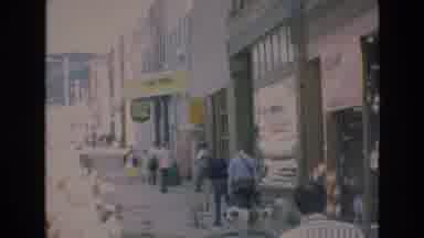COLORADO SPRINGS COLORADO USA .-1973: Tourists Walk Down A Bustling Street And A
