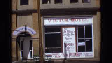 COLORADO SPRINGS COLORADO USA .-1973: Hotel On Street Corner Cut With A Clip Of