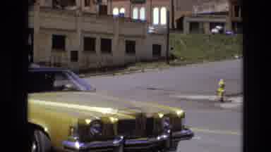 COLORADO SPRINGS COLORADO USA .-1973: Truck Passing Car Parked On Street
