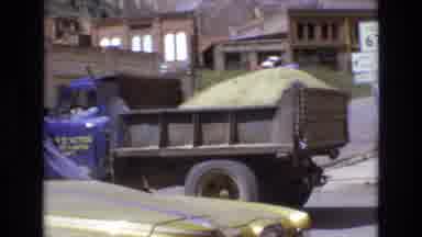 COLORADO SPRINGS COLORADO USA .-1973: Man Driving A Truck With Sand In It Down