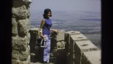 COLORADO SPRINGS COLORADO USA .-1973: Vintage Woman In Blue Walking Along Stone