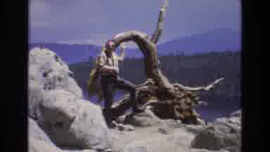 Lake Tahoe Nevada USA (1973): Mid Age White Male Standing With One Leg And Hand On