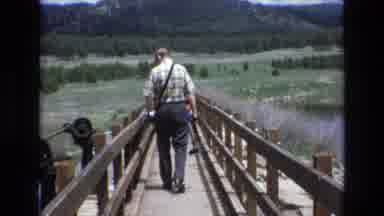Lake Tahoe Nevada USA (1973): Man On Bridge With Family