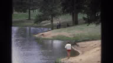 Lake Tahoe Nevada USA (1973): View Of A Lake Where A Man Is Fishing In The Summer