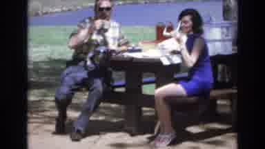 Lake Tahoe Nevada USA (1973): Man And Woman Share A Coffee In The Sun