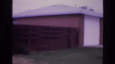 New Mexico USA (1973): Couple In Front Of Their One Story House Then Fence Before