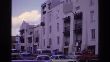 New Mexico USA (1973): Front Of White Building And Traffic