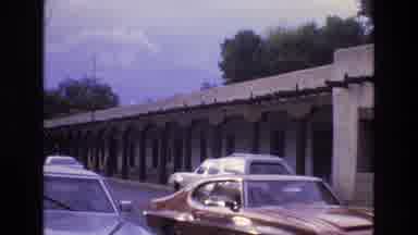 New Mexico USA (1973): Door And Windows Seen Through Foliage As Well As Cars