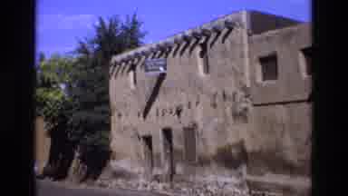 New Mexico USA (1973): Old Pueblo Structure With A Sign Above The Door