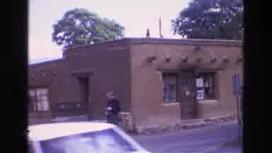 New Mexico USA (1973): Brown Shopping Center Guarded With A Security Person And