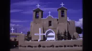 NEW MEXICO USA-1973: Southwestern-Style Church With White Crosses Stands Before
