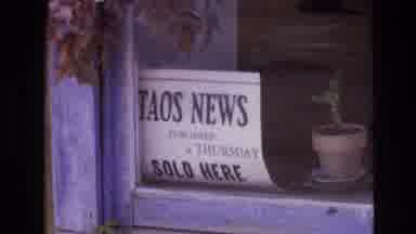 New Mexico USA (1973): A Sign In A Storefront And A Sign Hanging Above A Store