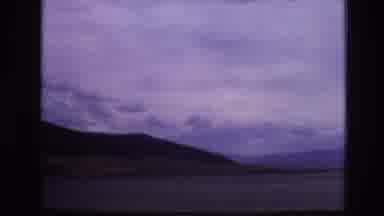 New Mexico USA (1973): Driving Past The Beginning Of A Mountain Range Showing An