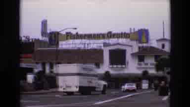 San Francisco California USA (1973): Cars Driving Towards A Grotto As People Pass