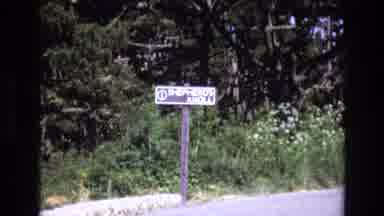 San Francisco California USA (1973): Observing A Small Wooden Sign On The Side Of